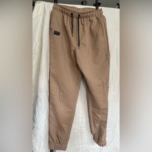 Khaki pants with elastic waistband and cuffs, drawstring, adult size medium